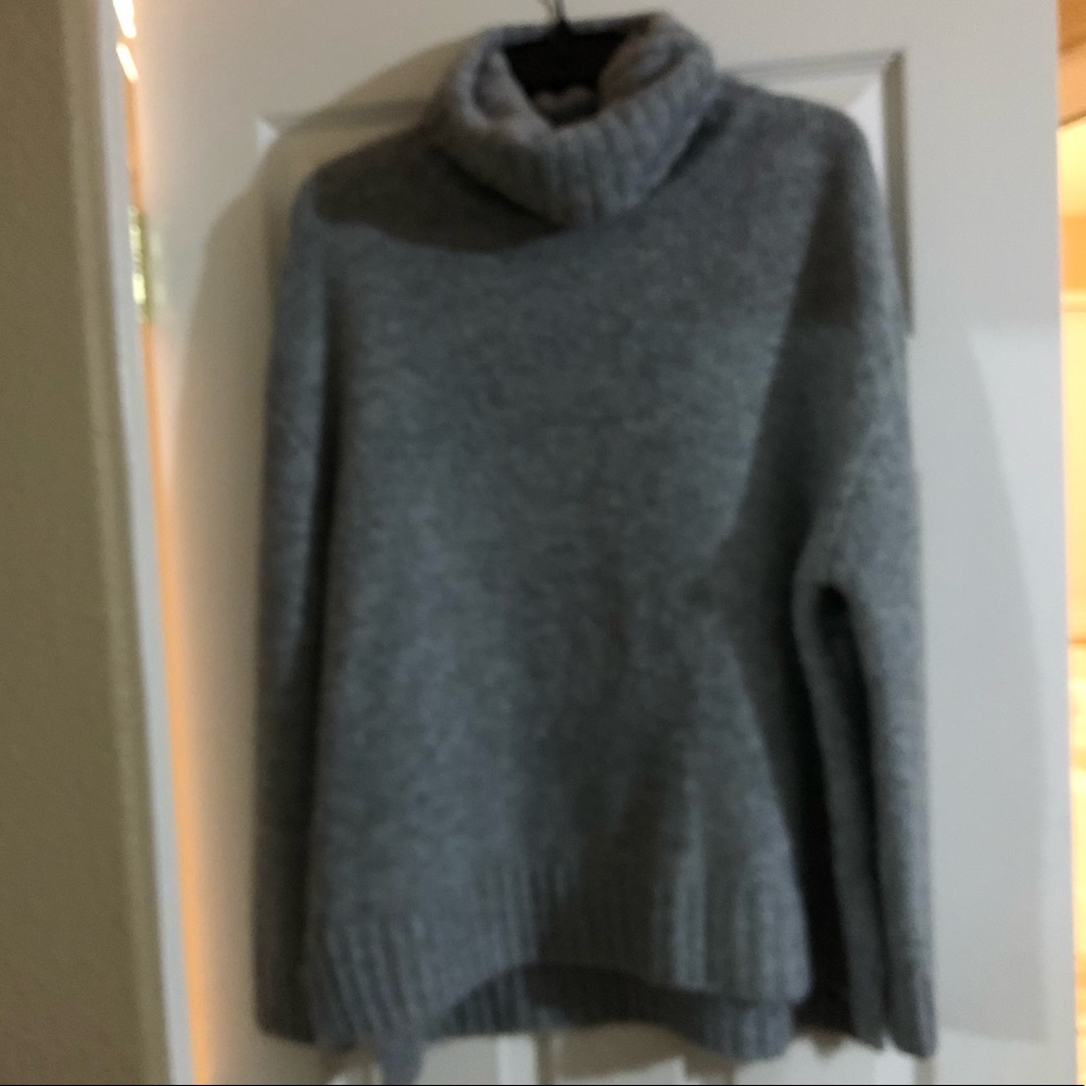 Gray cowl neck sweater with slide slit